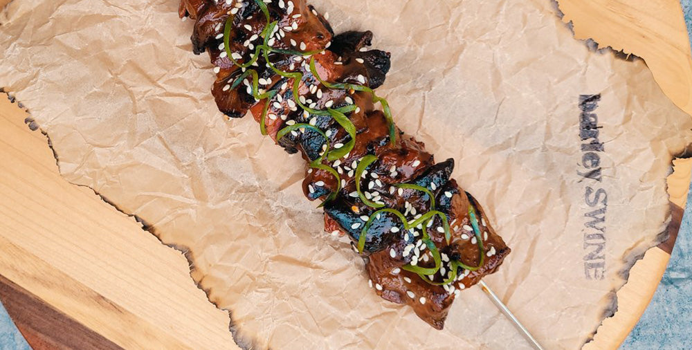 black pearl oyster skewers with peach bbq sauce
